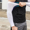A person is applying or adjusting a black cooling arm sleeve on their upper arm, showing the fit and UV protection area.