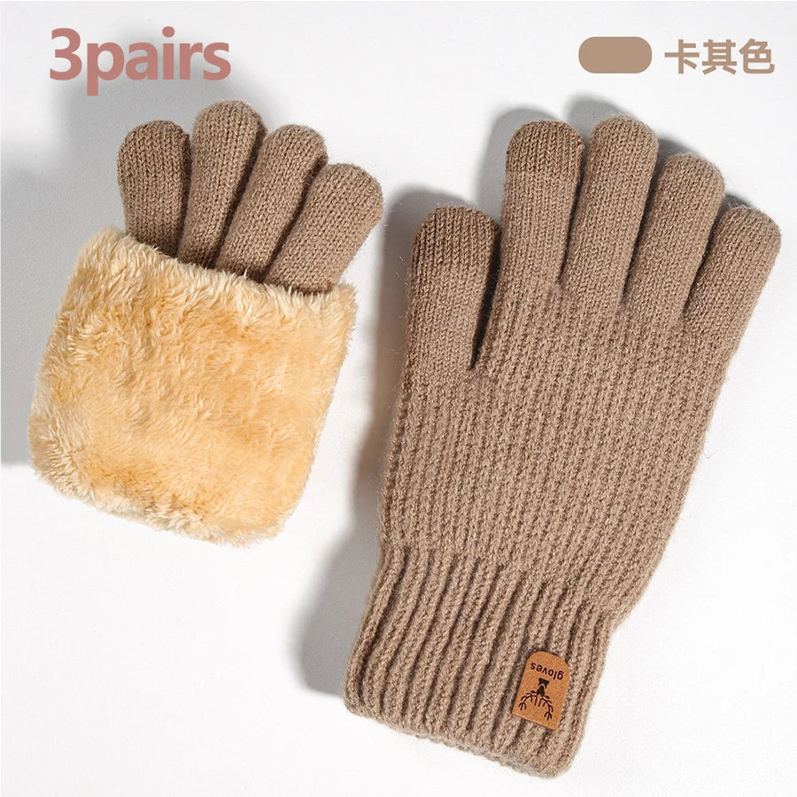 Three pairs of beige knit thermal gloves shown on a white background.