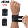 Black dual wrist support brace shown on a hand, demonstrating its fit and design.