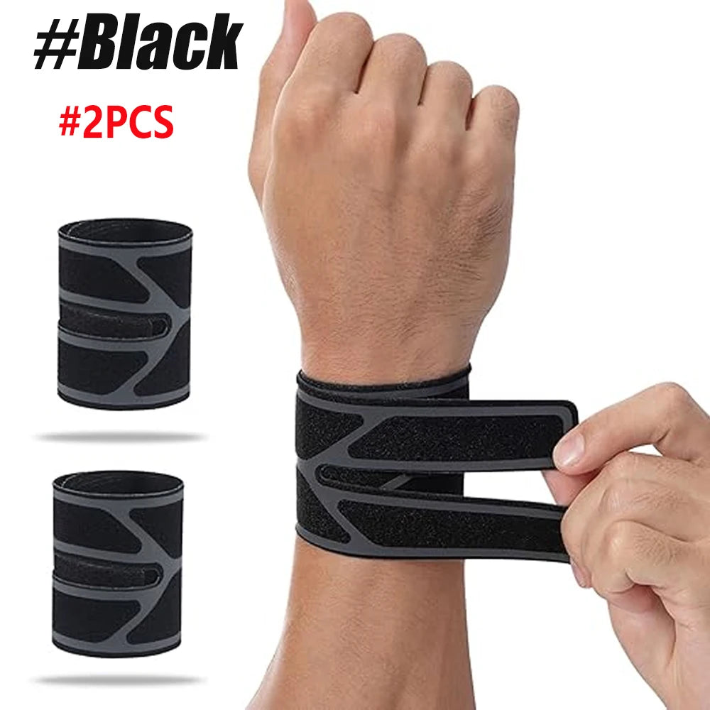 Black dual wrist support brace shown on a hand, demonstrating its fit and design.