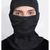A man wearing a black breathable mesh balaclava face mask covering his head and lower face.