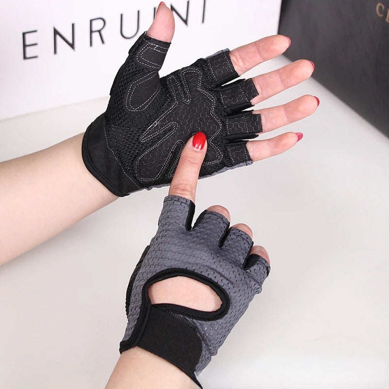 A hand wearing a black anti-slip fingerless gym glove with wrist support, shown against a white background.