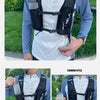 A black Zela backpack worn by a person, featuring a water bottle holder.