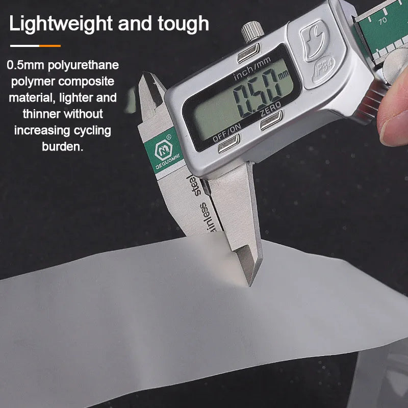 A close-up of a lightweight and tough bicycle puncture protection liner tool measuring 0.5mm thickness.