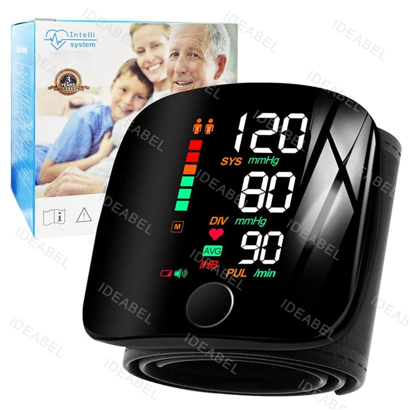 Black digital wrist blood pressure monitor displaying 120/80 mmHg and heart rate, shown next to its box.