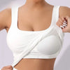 White racerback padded tank top worn by a woman, showing the front view of the garment.