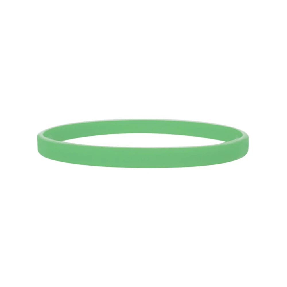 A smooth, light green silicone wristband shown flat.