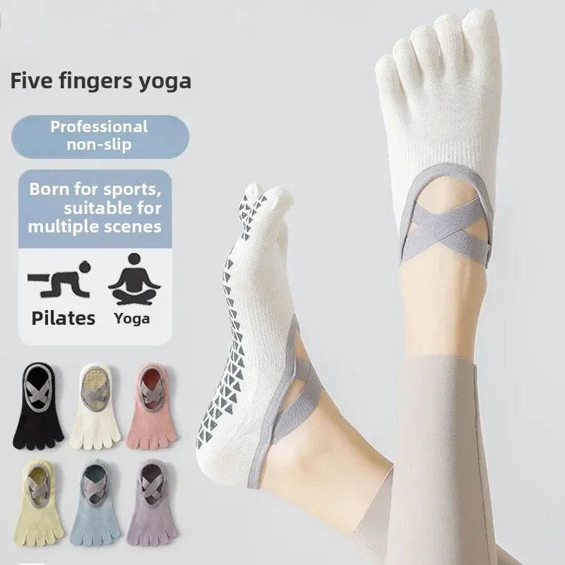 A pair of white five fingers yoga socks shown on a foot, with various colored options displayed below.
