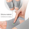 Close-up of a gray silicone arch support insole being placed on a foot to demonstrate comfort and non-collapsing features.