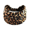 A close-up of a brown and black leopard print cotton stretch headband.