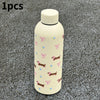 Taza térmica de acero inoxidable doble pared color beige claro con estampados florales y de animales rosas