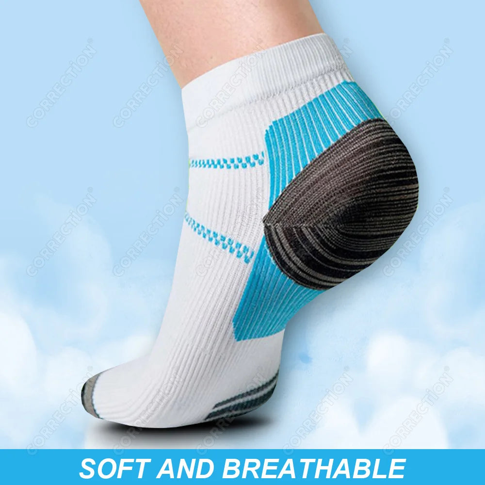 White compression socks with blue accents and a black heel, designed for plantar fasciitis relief.