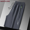 Gray men's quick dry jogging shorts with a zippered pocket and a stylized logo
