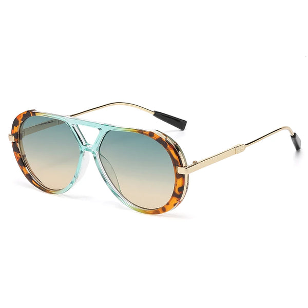 Vintage oversized designer sunglasses with tortoiseshell frames and gradient green lenses