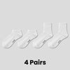 Four pairs of white breathable sports performance socks laid out flat.