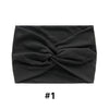 Black fabric headband tied in a knot, shown flat.