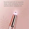 Close-up of a pink automatic electric eyebrow trimmer with a round hat metal knife net design.