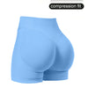 Light blue compression fitness shorts shown from the side.