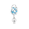 A blue floral patterned retractable ID badge reel keychain with a silver clasp.