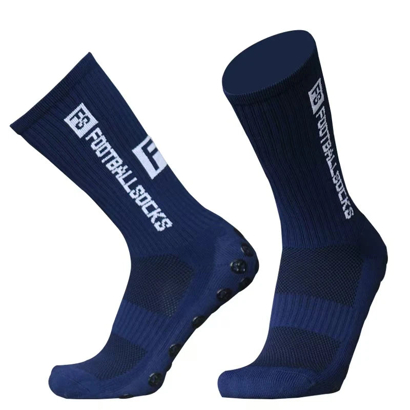 A pair of navy blue anti-slip silicone grip football socks shown from the side.
