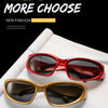 A pair of red sunglasses and a pair of gold-framed sunglasses are displayed on a white surface.