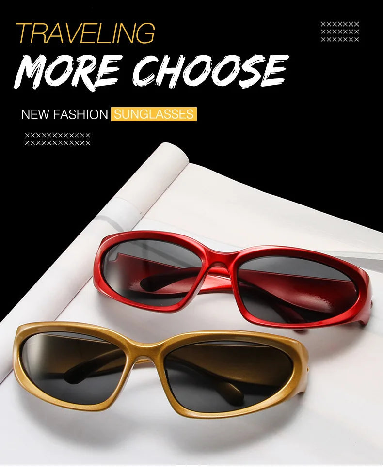 A pair of red sunglasses and a pair of gold-framed sunglasses are displayed on a white surface.