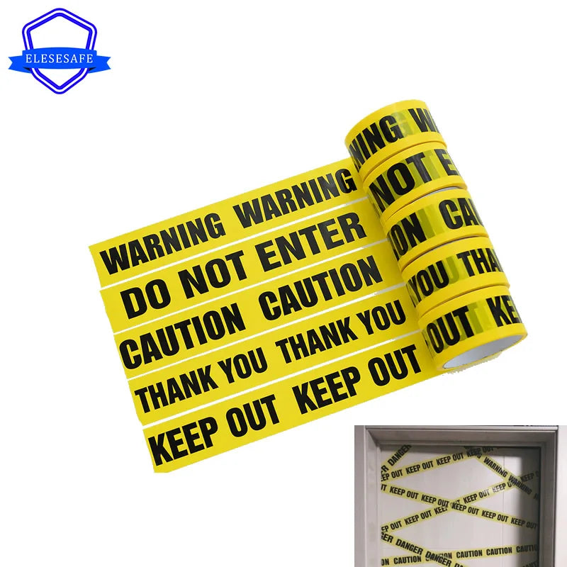 A roll of yellow industrial safety warning tape with black text warning do not enter caution thank you keep out