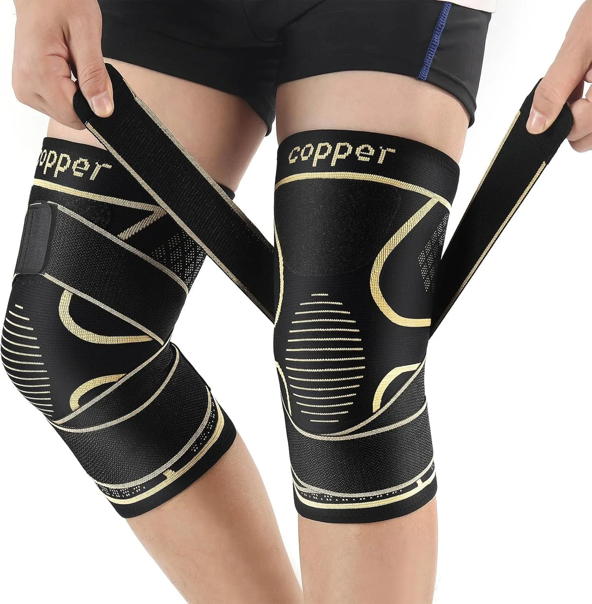 Férulas de cobre negro para la rodilla, usadas en la pierna de una persona.