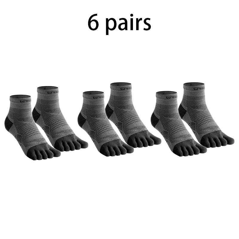 Six pairs of black high-performance five-finger compression socks laid out.