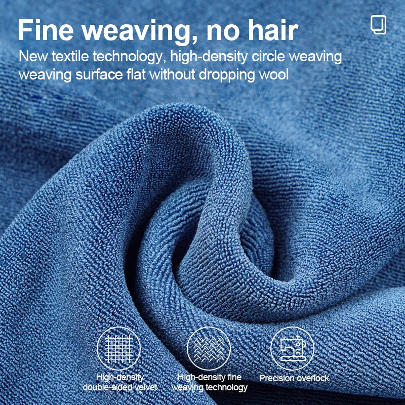 Close-up of a blue fine weaving textile showing high-density circular weaving and precision overlock stitching.