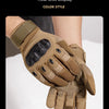 A close-up of tan tactical full finger gloves being held, showing the texture and design.