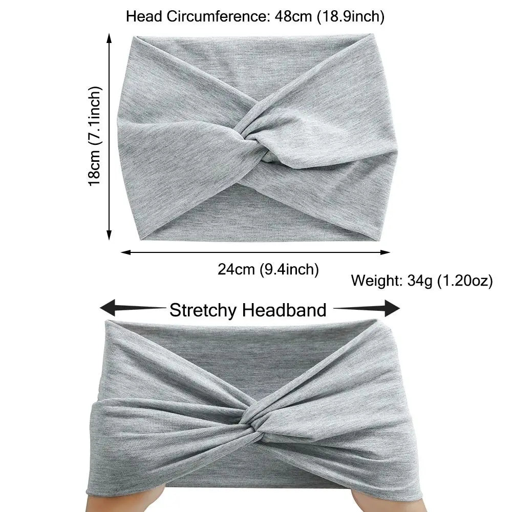 A gray stretchy fabric headband is shown folded and worn on a person's head.