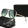 A pair of olive green fashion protective sunglasses resting on a black leather pouch next to a black box.