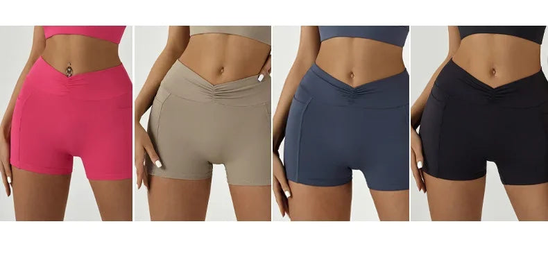 A set of four high-waisted yoga and fitness leggings in pink, beige, navy blue, and black shown on a model.