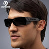 A man wearing black KDEAM polarized sports sunglasses against a gray background.