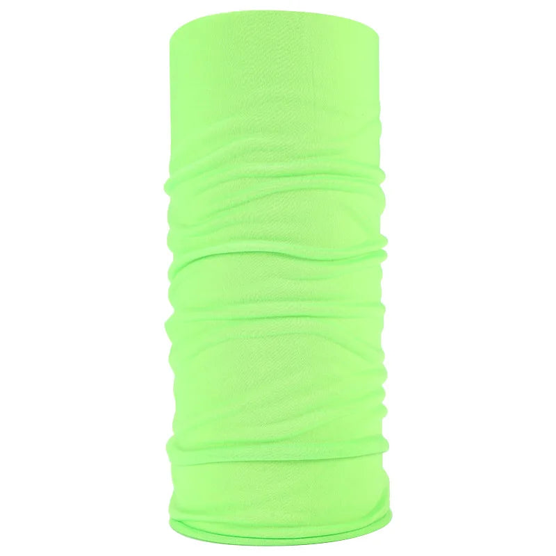 A bright lime green seamless fabric headband or balaclava rolled up.