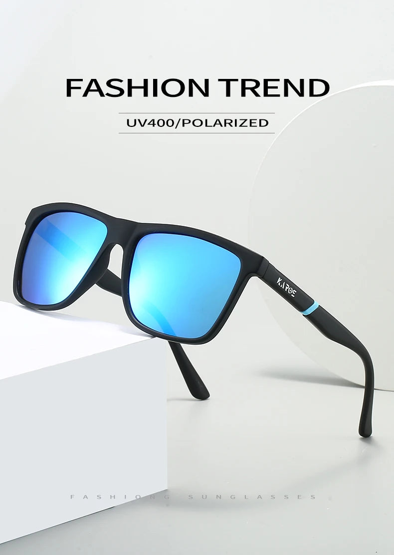 A pair of black polarized sunglasses with bright blue lenses resting on a white surface.