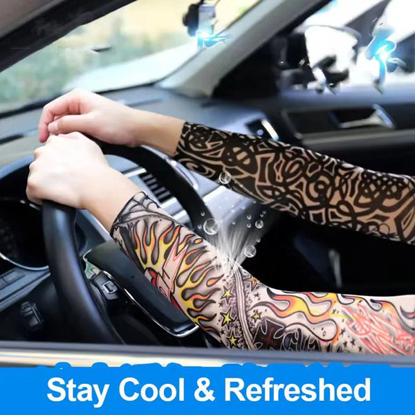 A person is wearing colorful, patterned arm sleeves while driving a car.