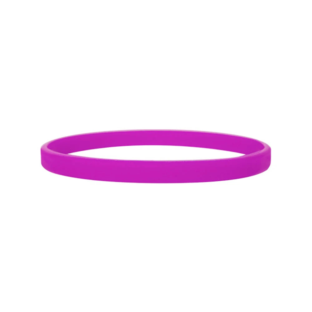 A bright purple silicone wristband for fitness or fashion.