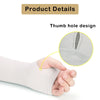 A hand is holding a light gray UV protection arm sleeve with a thumb hole design.