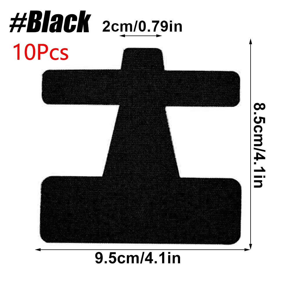 Black kinesiology tape shaped like a cross with a rectangular base for bunion and toe support