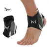 Two black compression ankle support foot sleeves worn on a person's ankle.