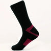 Black hiking socks with a magenta chevron design shown from the side.