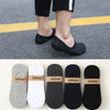 A collection of multi-colored breathable cotton ankle socks in gray, white, dark gray, and black.