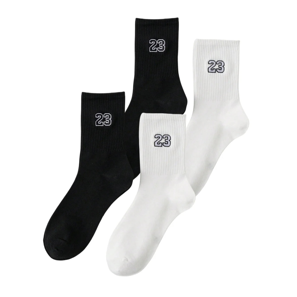 A set of three black and white men's classic crew socks with the number 23 visible on each.
