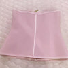 A light pink double compression waist trainer corset body shaper displayed flat.