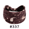 Dark brown boho knotted cotton headband featuring crescent moon and star designs