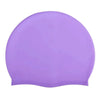 A smooth, purple waterproof silicone swim cap for adults and children.