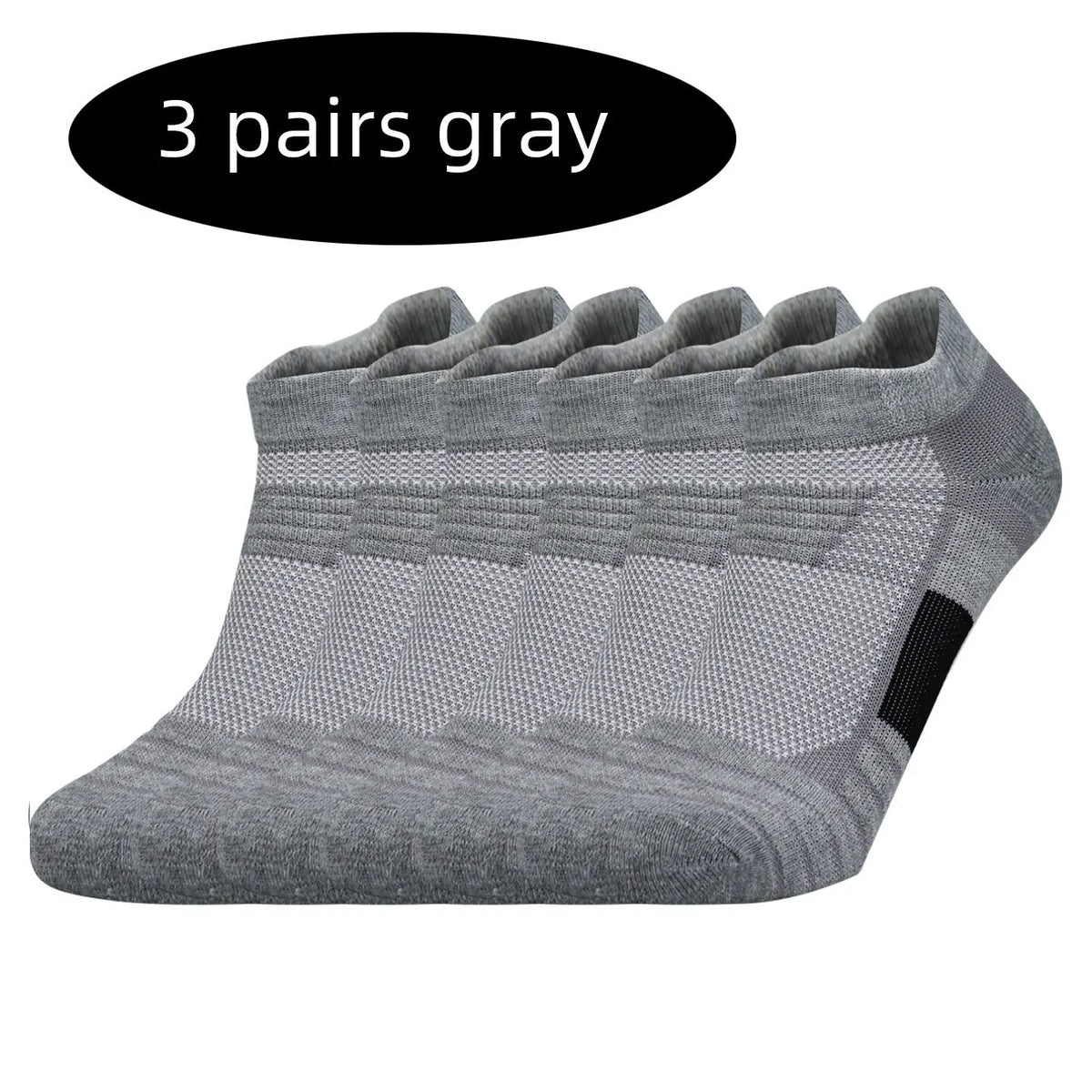 Three pairs of gray performance running socks stacked together.
