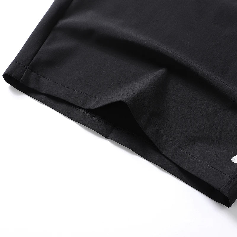 Black men's quick dry jogging shorts folded and laid flat